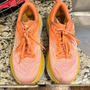 Hoka Bondi 8 - light orange with yellow and light blue accents - comfortable